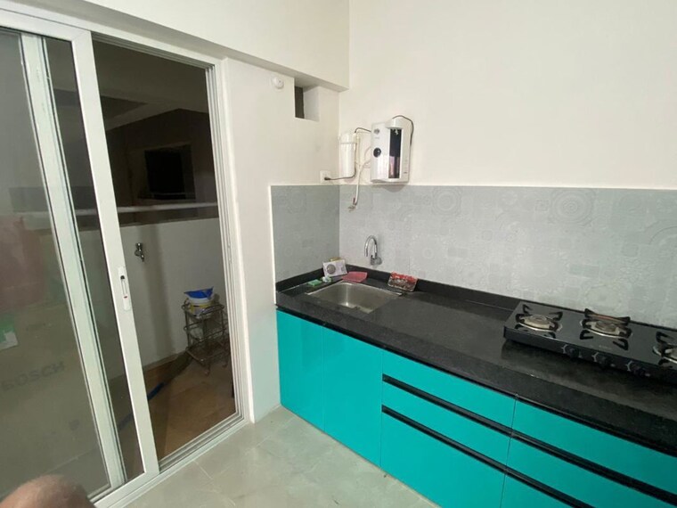 Kitchen, paranjape-trident-twin-towers 3 Bedroom 1200 Sq.Ft. Apartment In Wakad Pune 10561912