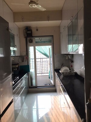 Kitchen in 3 BHK Apartment at Rustomjee Urbania Azziano, Thane West – for Rent