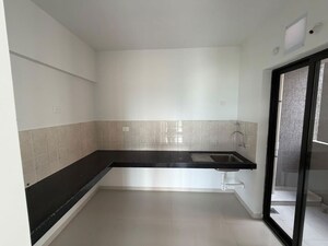 Kitchen in 2 BHK Apartment at Shapoorji Pallonji Joyville Hinjewadi, Hinjewadi – for Rent