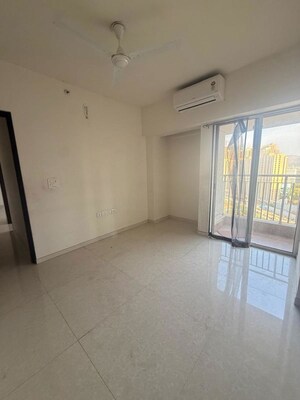 Room in 2 BHK Apartment at Lodha Amara, Kolshet Road – for Sale