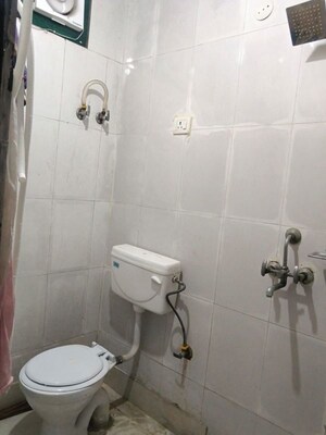 Bathroom in 2 BHK Apartment at RWA Apartments Sector 122, Sector 122 – for Rent