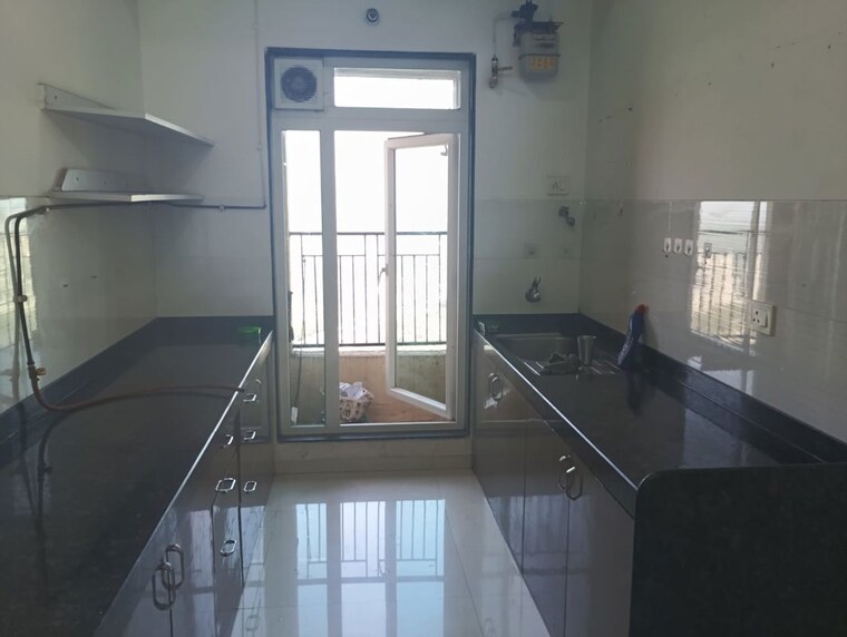 Kitchen, rustomjee-azziano-wing-e 2 Bedroom 800 Sq.Ft. Apartment In Thane West Thane 10562128
