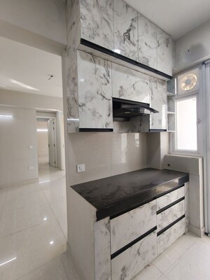 Kitchen in 2 BHK Apartment at Eldeco Live By The Greens, Sector 150 – for Rent