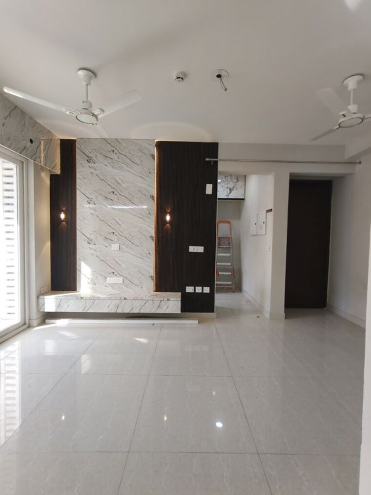 Living Room, eldeco-live-by-the-greens 2 Bedroom 1137 Sq.Ft. Apartment In Sector 150 Noida 10562319