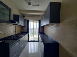 Kitchen in 3 BHK Apartment at Romell Diva, Malad West – for Rent