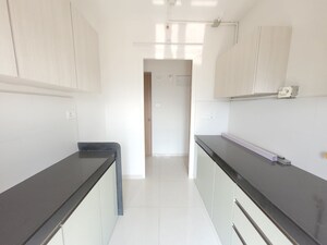 Kitchen in 2 BHK Apartment at Godrej Emerald, Ghodbunder Road – for Rent