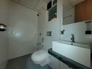 Bathroom in 2 BHK Apartment at Godrej Emerald, Ghodbunder Road – for Rent