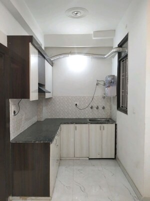 Kitchen in 2 BHK Builder Floor at BCC Bharat City Phase II, Indraprastha Yojna – for Sale