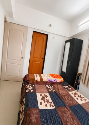 Bedroom in 2 BHK Apartment at Neeta Rivaah Regency, Wagholi – for Rent