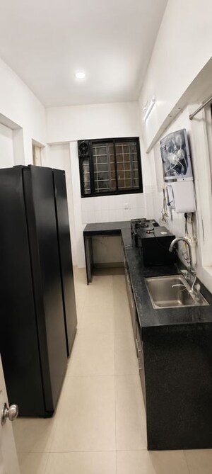 Kitchen in 2 BHK Apartment at Neeta Rivaah Regency, Wagholi – for Rent