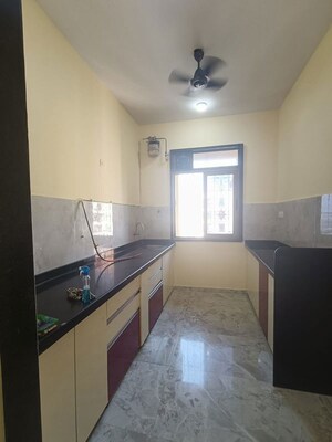 Kitchen in 3 BHK Apartment at Larkins Pride Palms, Kolshet Road – for Rent