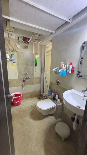 Bathroom in 1 BHK Apartment at Metropolis Bayside, Kasarvadavali – for Rent
