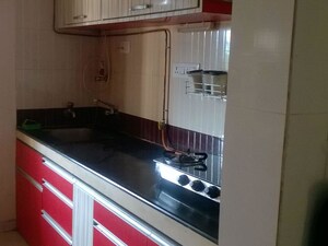 Kitchen in 2 BHK Apartment at Cosmos Springs Angel, Ghodbunder Road – for Rent