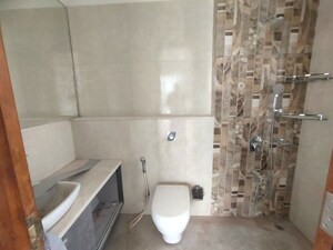 Bathroom in 3 BHK Apartment at Omkar Alta Monte, Malad East – for Rent