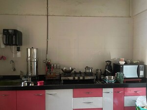 Kitchen in 1 BHK Apartment at Satyam CHS Naupada, Naupada – for Sale