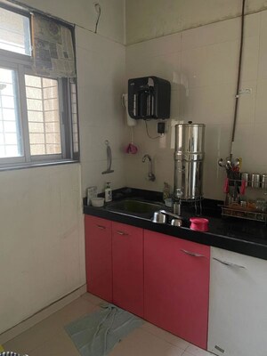 Kitchen in 1 BHK Apartment at Satyam CHS Naupada, Naupada – for Sale