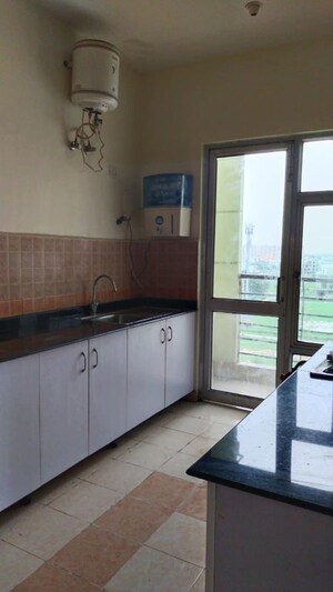 Kitchen in 3 BHK Apartment at Shalimar One World Belvedere Court 3, Gomti Nagar – for Rent