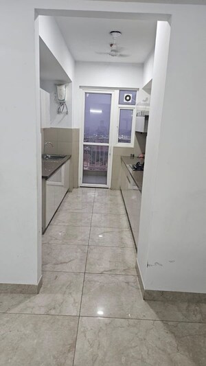 Kitchen in 3.5 BHK Apartment at Emaar Palm Gardens, Sector 83 – for Rent
