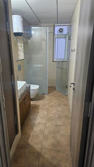 Bathroom in 3.5 BHK Apartment at Emaar Palm Gardens, Sector 83 – for Rent
