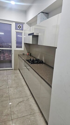 Kitchen in 3.5 BHK Apartment at Emaar Palm Gardens, Sector 83 – for Rent