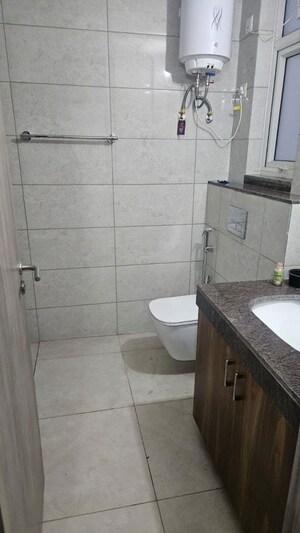 Bathroom in 3.5 BHK Apartment at Emaar Palm Gardens, Sector 83 – for Rent