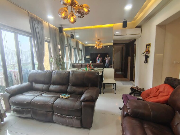Living Room, amanora-adreno-towers 2 Bedroom 752 Sq.Ft. Apartment In Hadapsar Pune 10563461