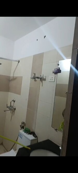 Bathroom in 2.5 BHK Apartment at Ashiana Palm Court, Raj Nagar Extension – for Rent