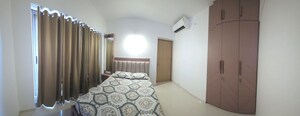 Bedroom in 2 BHK Apartment at Lodha Bellagio, Powai – for Rent