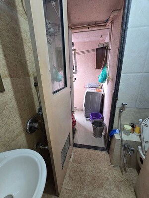Bathroom in 2 BHK Apartment at Swaraj Planet, Kopar Khairane – for Sale