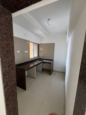 Building Lobby in 2 BHK Apartment at Ruparel Ariana, Parel – for Rent