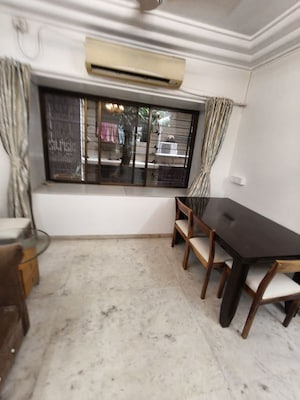 Living Room in 2 BHK Apartment at Everest Cleopatra, Vile Parle East – for Rent