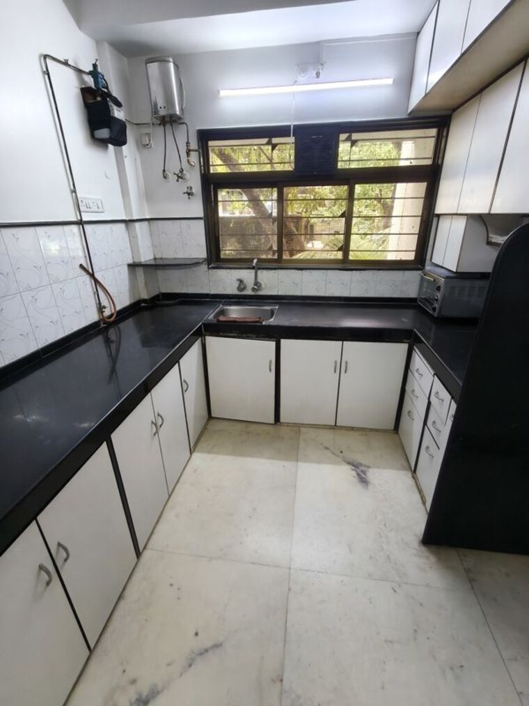 Kitchen, everest-cleopatra 2 Bedroom 1000 Sq.Ft. Apartment In Vile Parle East Mumbai 10564350