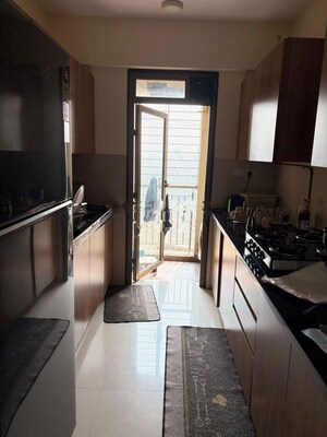 Kitchen in 2 BHK Apartment at Lodha Splendora, Ghodbunder Road – for Rent
