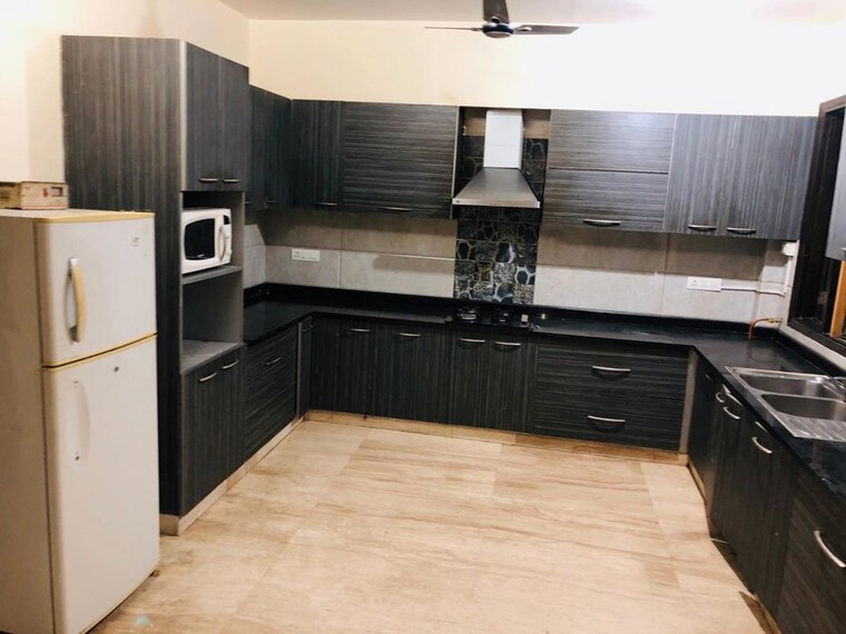Kitchen, malviya nagar 3.5 Bedroom 250 Sq.Yd. Builder Floor In Malviya Nagar Delhi 10564367