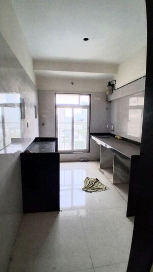 Kitchen in 2 BHK Apartment at Poonam Vaishno Heights, Malad East – for Rent