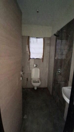 Bathroom in 2 BHK Apartment at Poonam Vaishno Heights, Malad East – for Rent