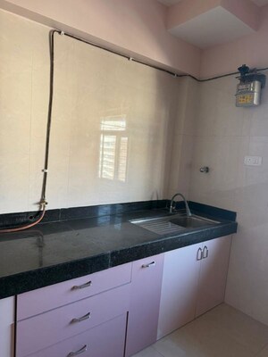 Kitchen in 3 BHK Apartment at Kalpataru Hills Phase II, Manpada – for Rent