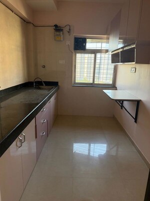 Kitchen in 3 BHK Apartment at Kalpataru Hills Phase II, Manpada – for Rent