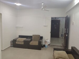Living Room in 1 BHK Apartment at Nav Jyotirling CHS, Malad East – for Rent