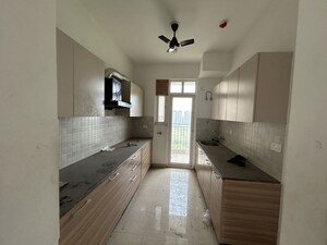 Kitchen in 3 BHK Apartment at ATS Homekraft Pious Hideaways, Sector 150 – for Rent