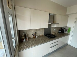 Kitchen in 2 BHK Apartment at Krisumi Waterfall Residences, Sector 36a – for Rent