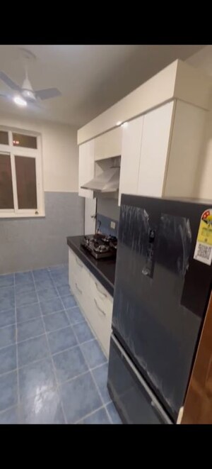 Kitchen in 3.5 BHK Apartment at Sikka Karmic Greens, Sector 78 – for Rent