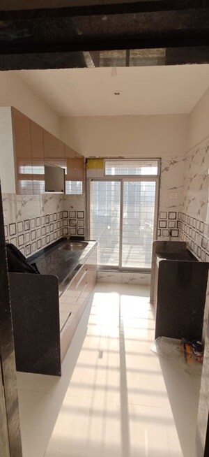 Kitchen in 1 BHK Apartment at Dheeraj Solitaire, Malad West – for Rent