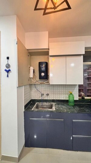 Kitchen in 2 BHK Apartment at Breez Global Heights, Sohna Sector 33 – for Rent