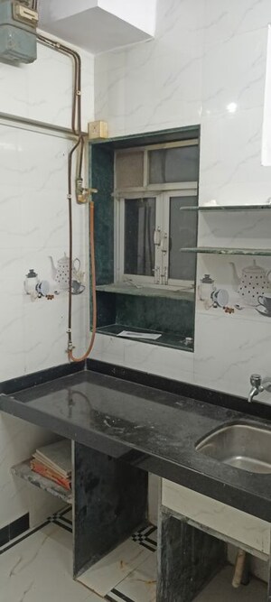 Kitchen in 1 BHK Apartment at Standard Prabha CHS, Prabhadevi – for Rent