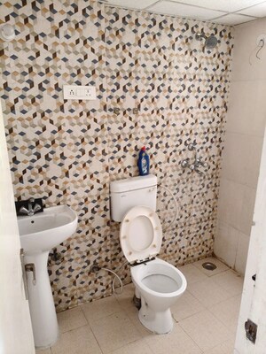 Bathroom in 2 BHK Apartment at Nilaya Greens, Raj Nagar Extension – for Rent