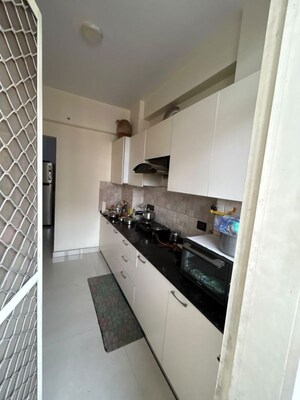 Kitchen in 2 BHK Apartment at Nilaya Greens, Raj Nagar Extension – for Rent