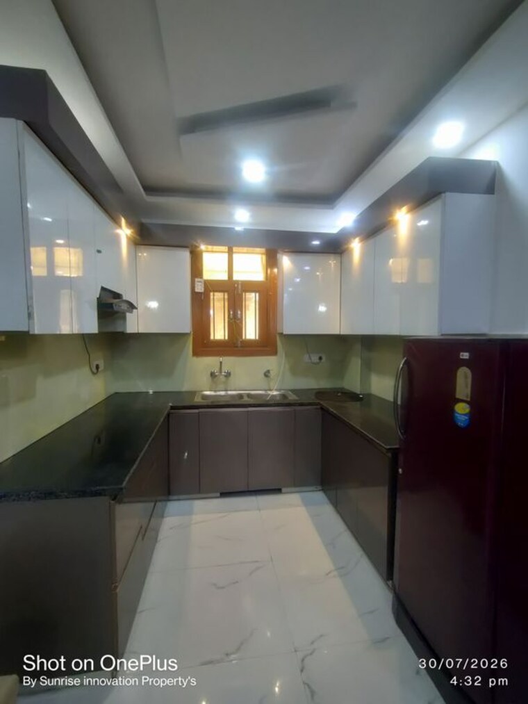 Kitchen, dwarka mor 3 Bedroom 100 Sq.Yd. Builder Floor In Dwarka Mor Delhi 10564807