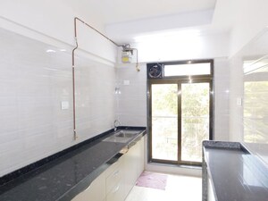 Kitchen in 1 BHK Apartment at Harshail Hornbill, Malad West – for Rent