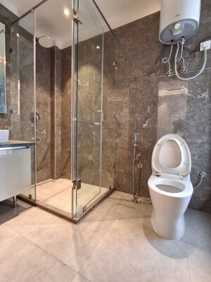 Bathroom in 4 BHK Builder Floor at Sushant Lok I – for Rent